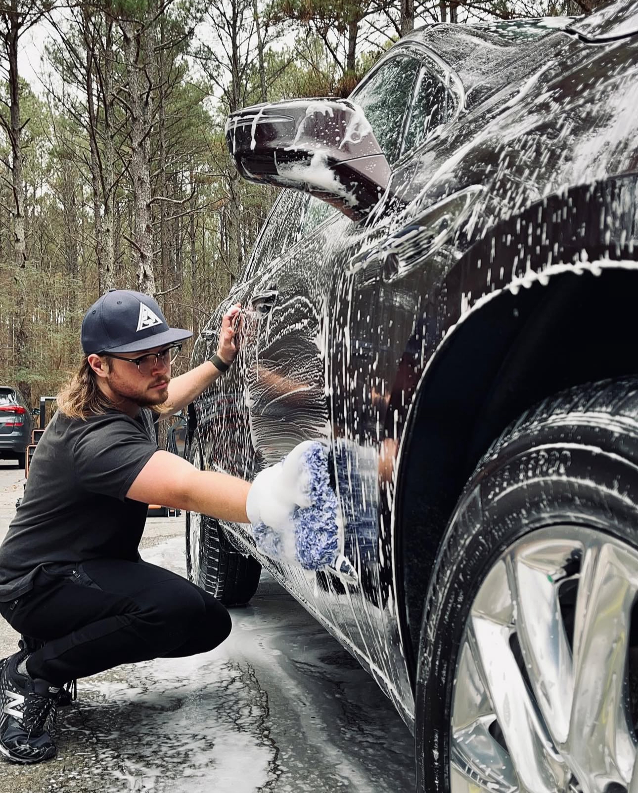 Tristan Miller working on customer's car